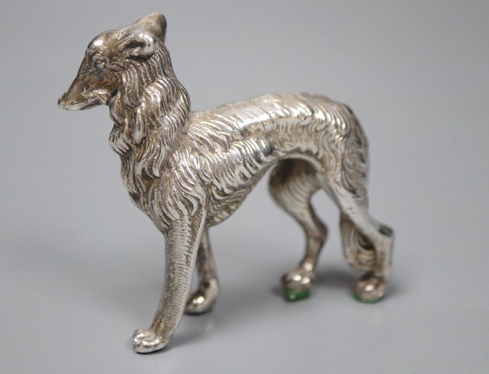 A modern silver model of a dog (filled), height 62mm.